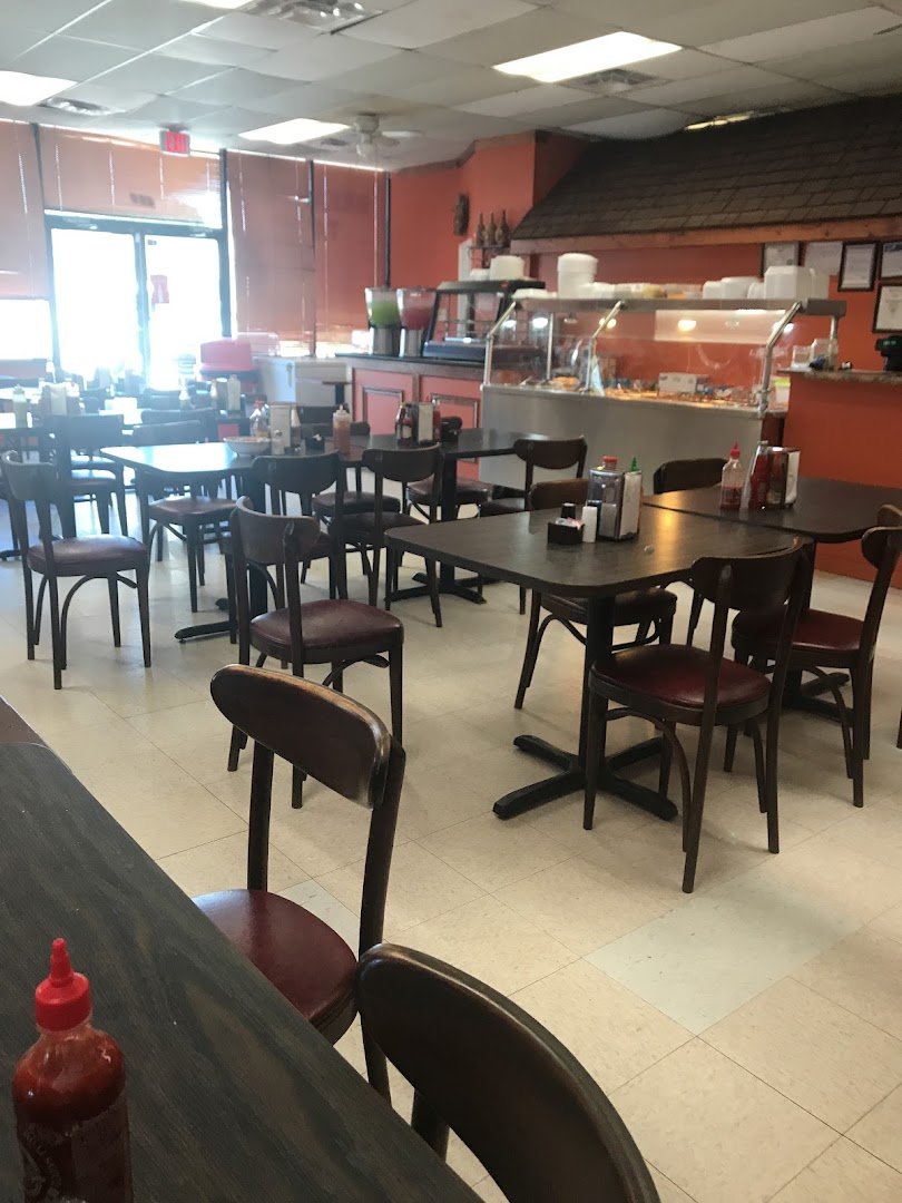 Casual seafood dining room with simple tables.